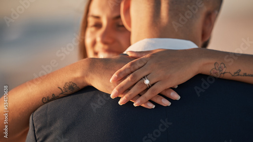 Obraz na płótnie Wedding, love and couple hug with ring, happiness and celebration for life partnership, bond and union at ceremony event