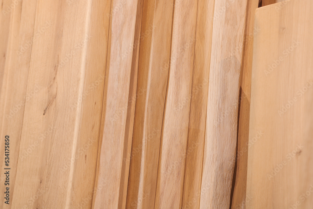 Fototapeta premium placks of wood stacked against each other wood table hardwood