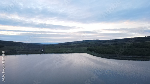 landscape drone picture moldova chisinau sunset sun clouds blue hour road forest farmland river