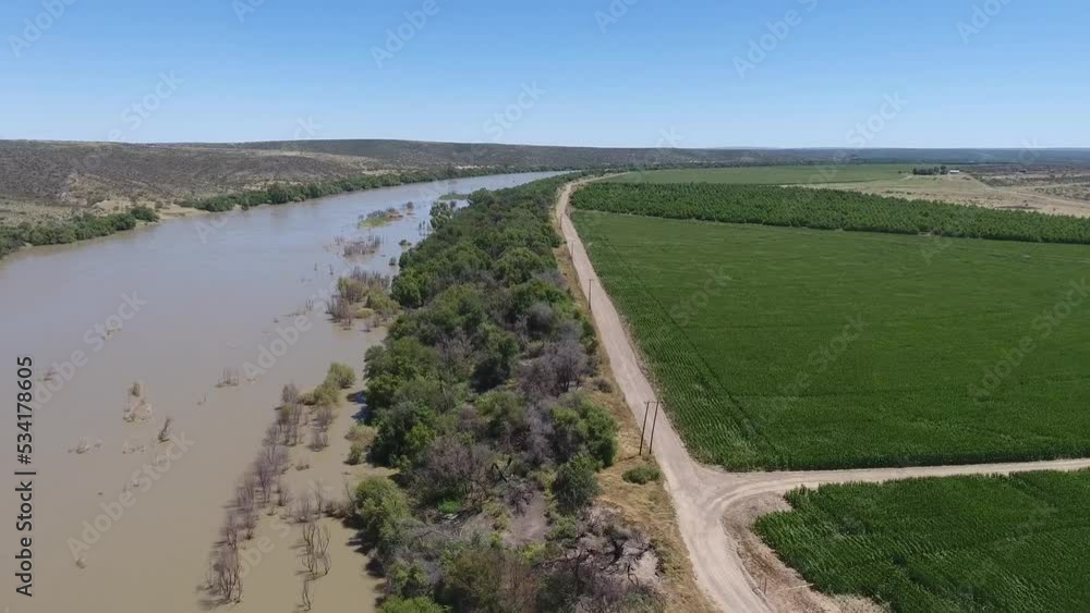 Aerial shot of river streams surrounded by agriculture land. Aerial shot of river streams surrounded by agriculture land.