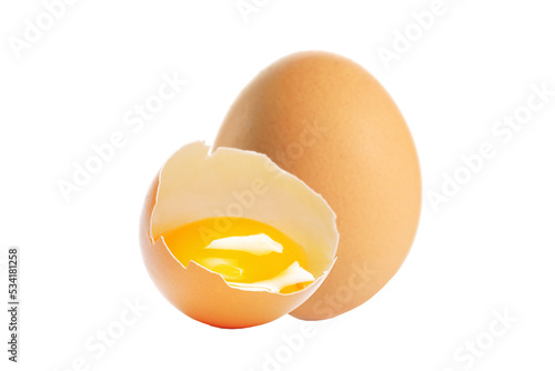 Broken and a whole raw egg