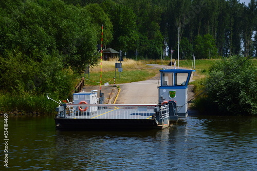 Ferry at the River Weser in the Village Schweringen, Lower Saxony photo