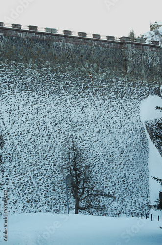 Snowy wall of the Diga Fregabolgia (Fregagolgia Dam) - Lombardy, Italy photo