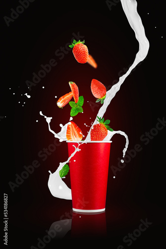 Milkshake splash. Milk cocktail with berries. Fresh strawberry berries falling in paper takeaway cup with milk splashes. Strawberry smoothie splash.