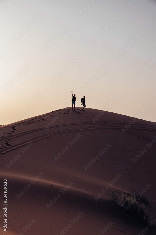 morocco dunes with low sun sunset sand travel sahara desert with orange colour 