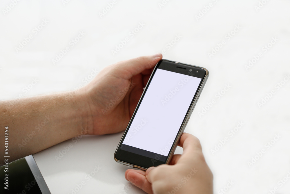 student doing research by phone student doing research by phone