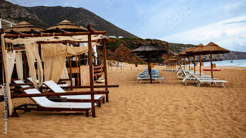 beach chairs and umbrellas on the beach