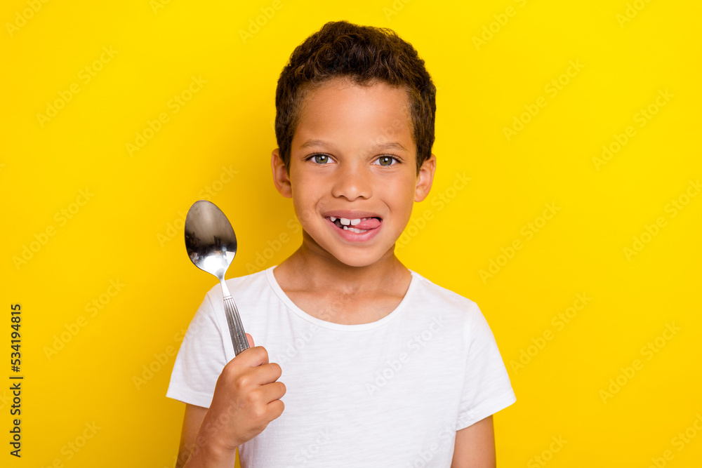 Portrait of hungry starving person boy dressed stylish trendy clothes wait his supper dessert yummy isolated on yellow color background Portrait of hungry starving person boy dressed stylish trendy clothes wait his supper dessert yummy isolated on yellow color background