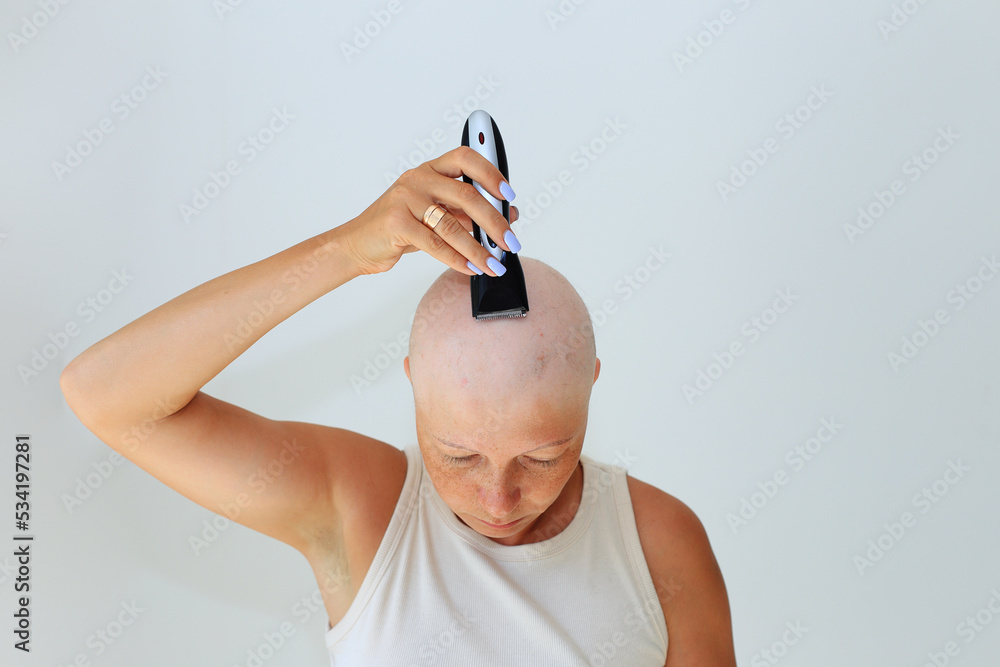 consequences of chemotherapy. Shaving off the last hair on the head