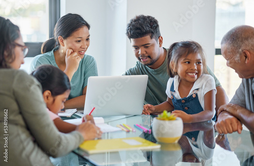 Learning  education and big family on table with laptop at home with kids studying and parents streaming online. Children  dad and mom with grandparents together in home teaching kids homeschooling.