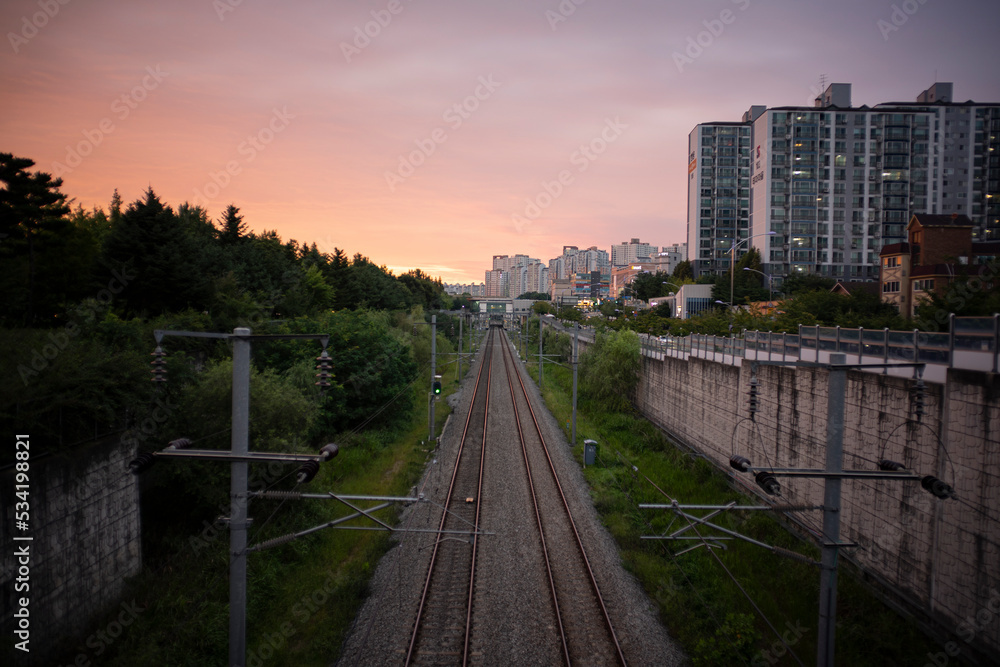 railroad track at sunset