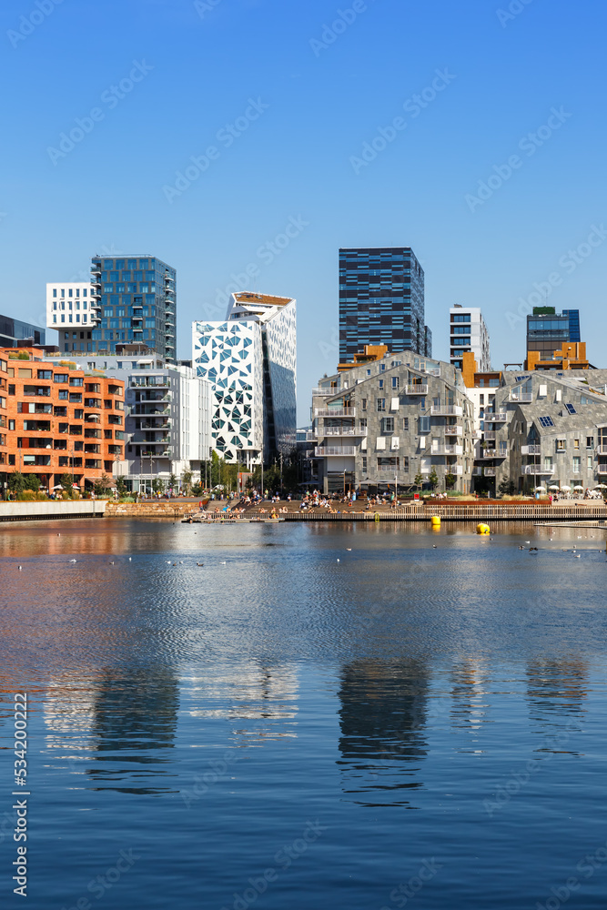 Oslo skyline modern city architecture buildings in new Bjorvika District portrait format in Norway