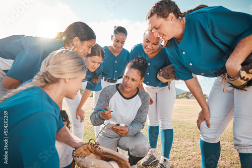 Fototapeta Naklejka Na Ścianę i Meble -  Coach of girl team in softball, planning with players before match or game. Trainer of woman baseball squad in huddle, talk on teamwork and strategy, motivation to win sport tournament or trophy