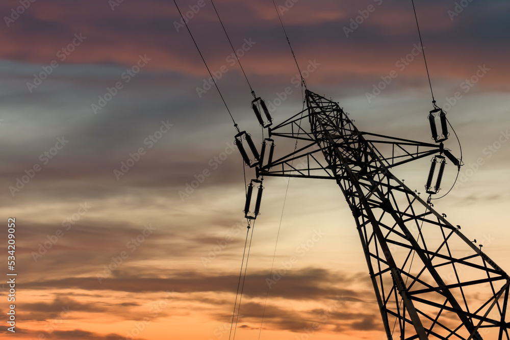 A transmission tower, also known as an electricity pylon. The concept of the energy crisis.
