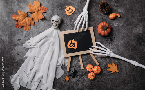 halloween pumpkin on a blackboard