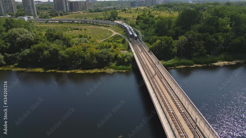 Drone video of Ottawa LRT light rail trail travelling on Hurdman Bridge over RIdeau River Drone video of Ottawa LRT light rail trail travelling on Hurdman Bridge over RIdeau River