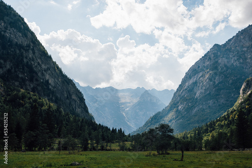 Alpine landscape countryside in sunny summer day in Val di Mello, Lombardy, Italy.