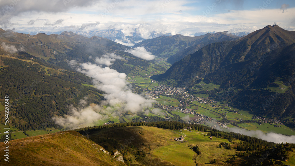 View from the Stubnerkogel mountain to the Gastein valley and the surrounding mountain peaks, Austria, Salzburg