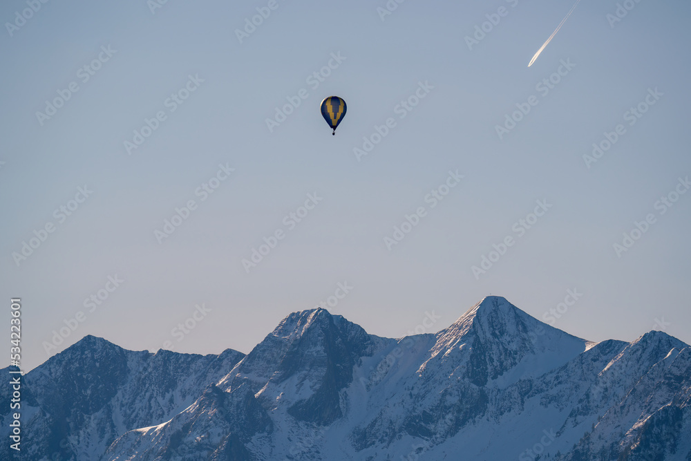 hot air balloon on the sunny morning in the mountains hot air balloon on the sunny morning in the mountains