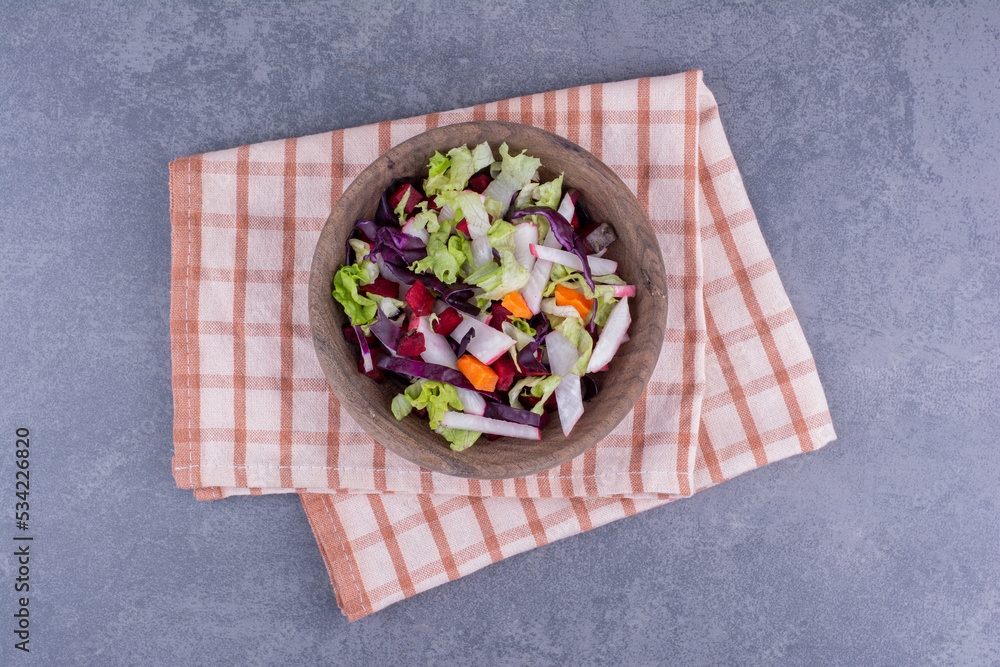 Green salad in a plate with mixed ingredients Green salad in a plate with mixed ingredients