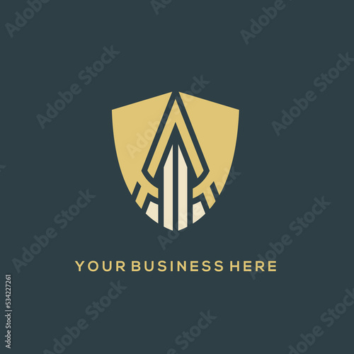 Shield logo.Powerful protection symbol, geometric design.Security icon isolated on dark background.Arrow pointing up on a defense sign.Modern, bold shape.