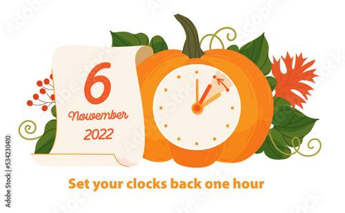 Daylight saving time ends 2022 concept. Alarm clock and calendar with the date of sunday, November 6