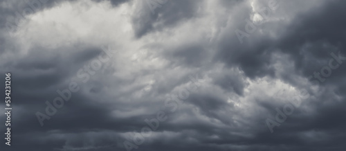 The sky was overcast with rain clouds forming. Storm and depression. Extreme weather and natural disaster. Dramatic sky background.