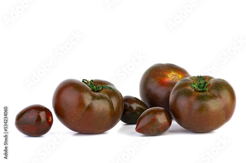 Tomato kumato isolated on white background