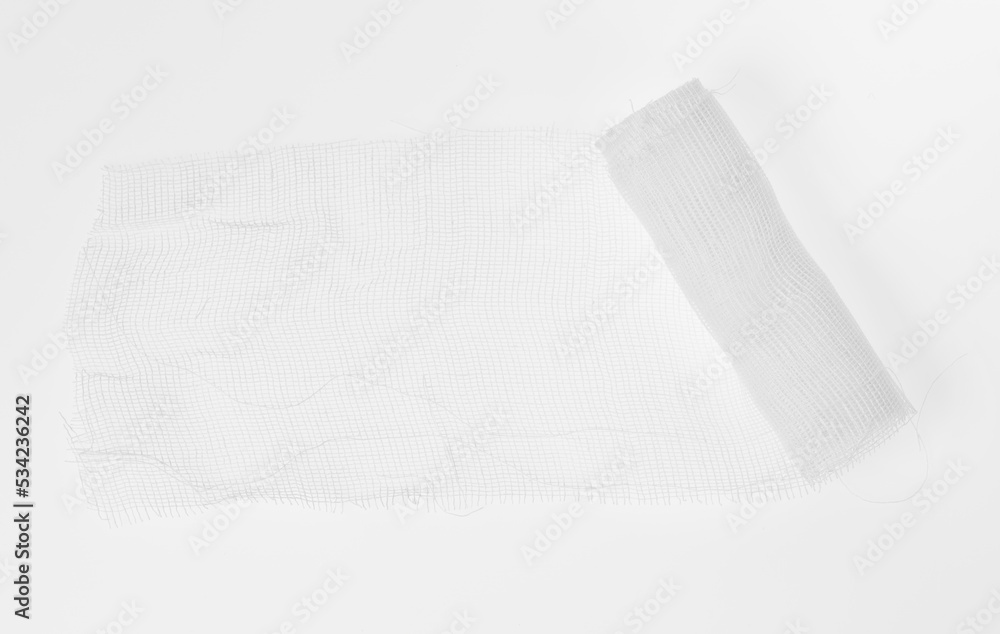 Obraz premium Medical cloth bandage on white background