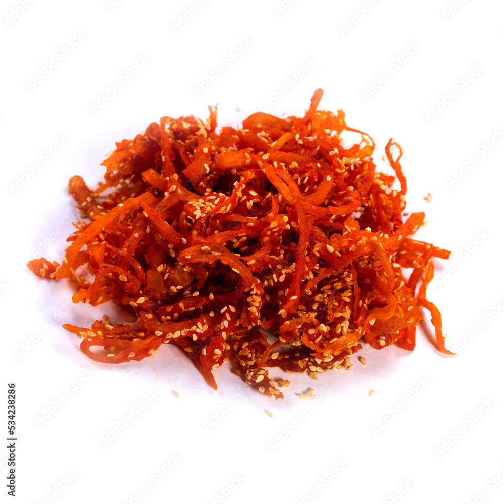 Fototapeta premium dried squid with sesame seeds and peppers on a white background