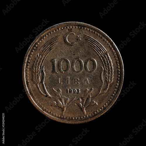 Closeup of Turkey 1000 Lira Coin 1993 on the black background photo