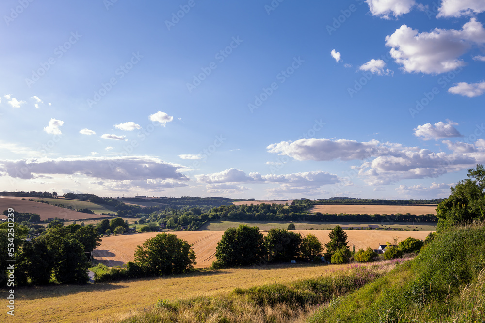Landscape of fields in Wiltshire on a summer afternoon, England