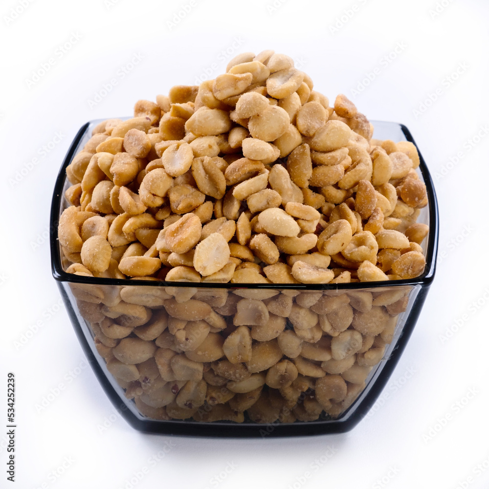 pile of spiced peanuts isolated close up on white background pile of spiced peanuts isolated close up on white background