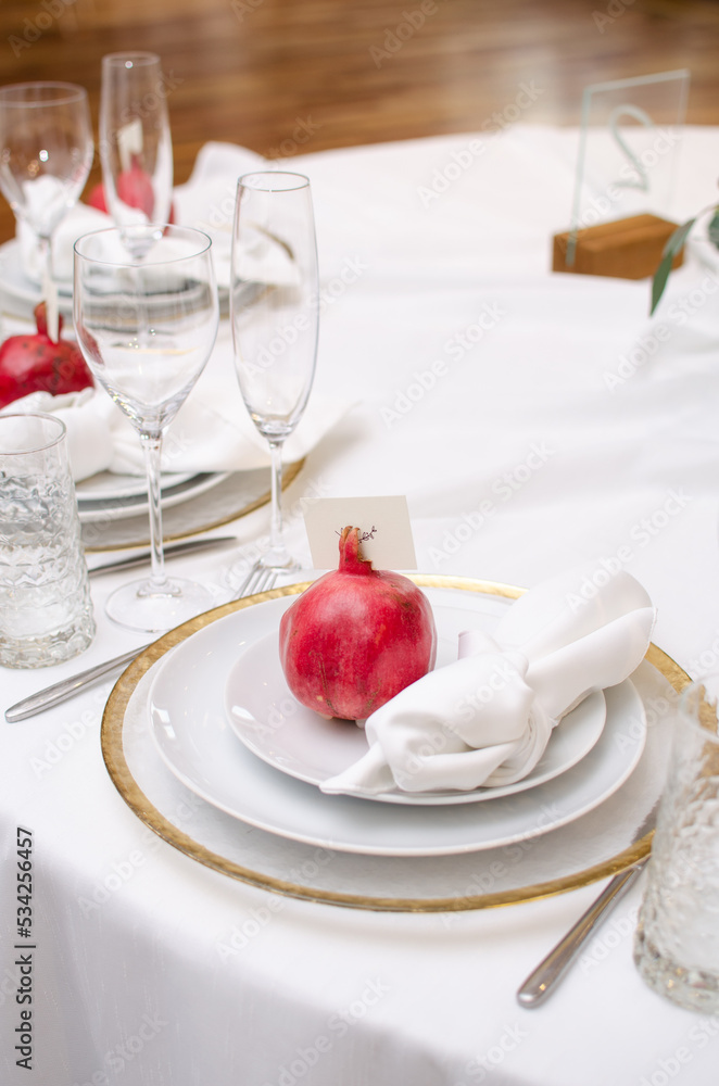 Beautiful wedding decoration. Banquet table setting and decoration. Flower decoration of wedding tables. Cutlery on the table.