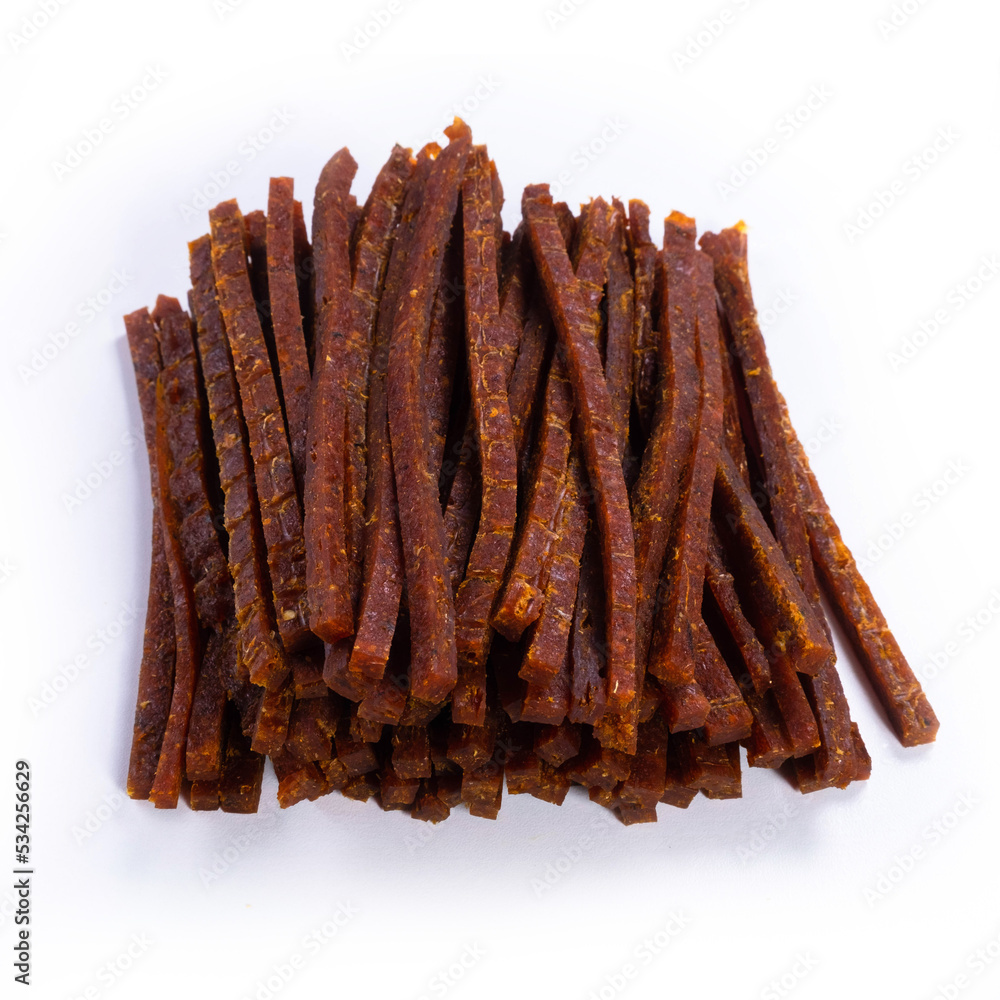dried fish stick with pepper, snacks for beer isolated on white background dried fish stick with pepper, snacks for beer isolated on white background