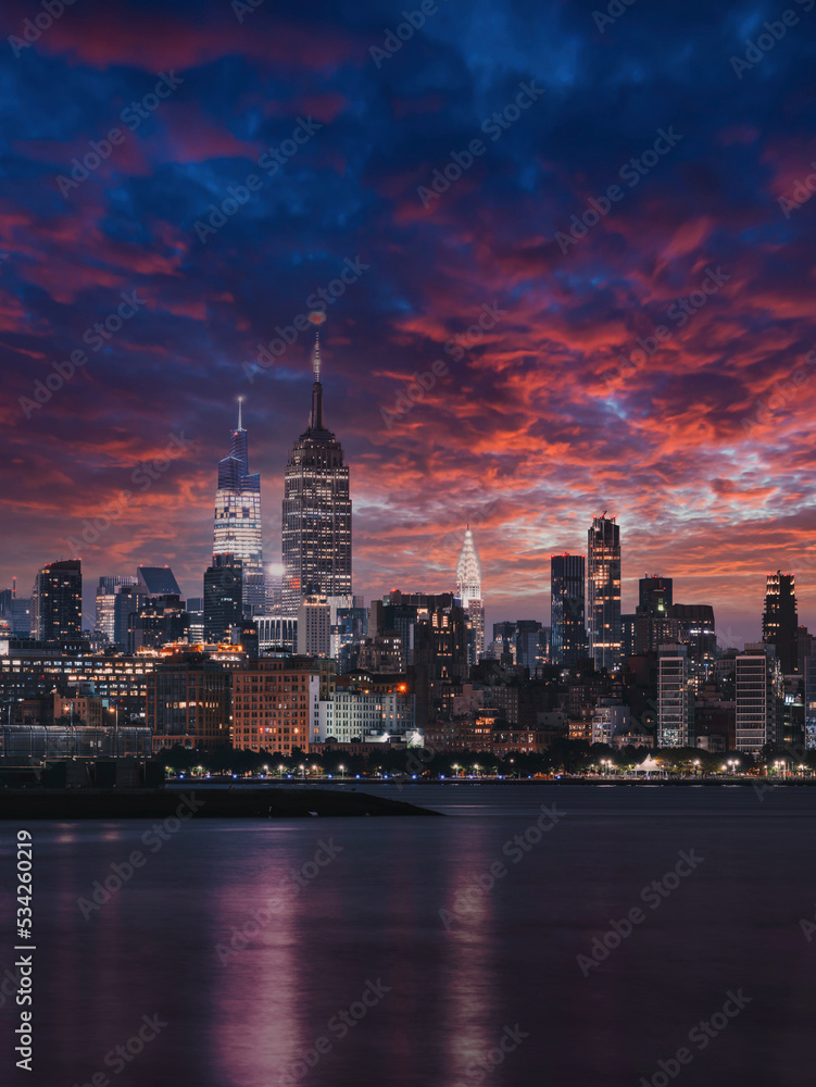 city skyline at sunset night  beautiful colors New York City manhattan river 