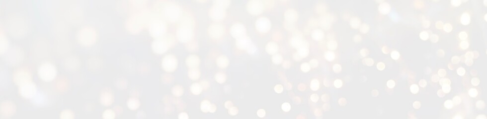 White Christmas background banner with bokeh lights - abstract festive xmas, wedding and new year panorama, header with copy space	