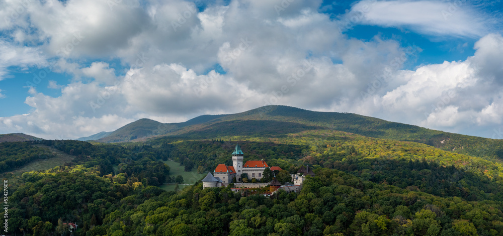 panorama landscape of Smolenice Castle in the Little Carpathians in lush green late summer forest panorama landscape of Smolenice Castle in the Little Carpathians in lush green late summer forest