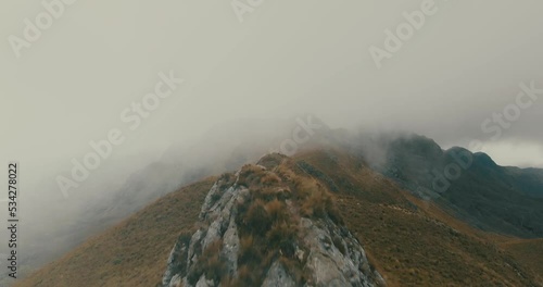 Drone footage of mist over the mountains of South America in Cuenca, Ecuador