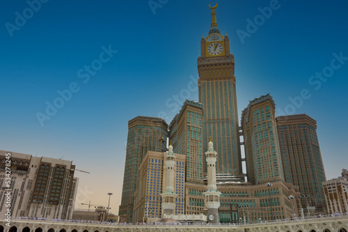 Skyline with Abraj Al Bait (Royal Clock Tower Makkah) (left) in Makkah, Saudi Arabia. The tower is the tallest clock tower in the world at 601m (1972 feet), built at a cost of USD1.5 billion. photo