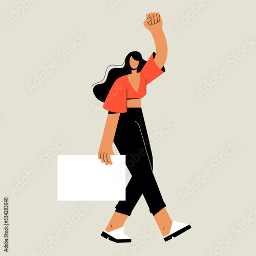 A tall woman with a poster at a rally. The woman protests and demands the right. Feminism and equality