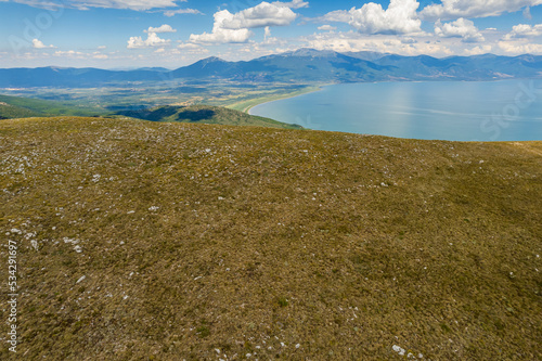 Aerial view of Ohrid-Prespa Transboundary Biosphere Reserve in National Park Galicica in North Macedonia of hill above Prespa lake photo