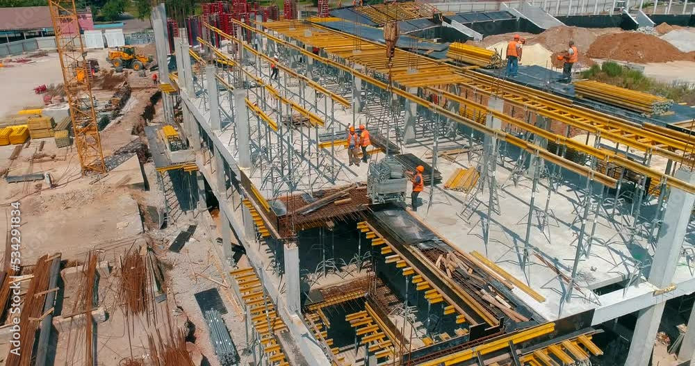 Aerial view of reinforced concrete construction. Builders make formwork