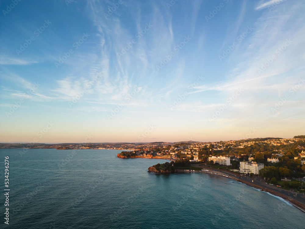 An aerial view of the resort of Torquay at sunrise in Devon, UK