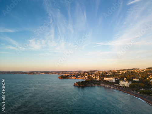 An aerial view of the resort of Torquay at sunrise in Devon, UK