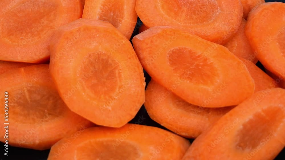 Carrots slice swirl on a white plate. Carrots slice swirl on a white plate.