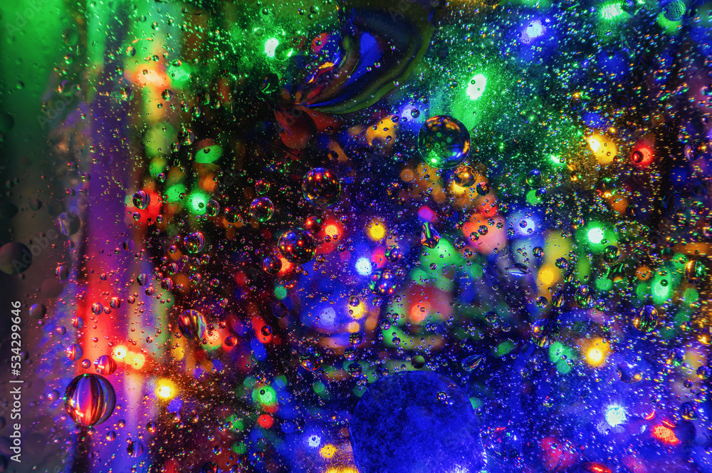 Multicolored abstract oil bubbles on water surface background