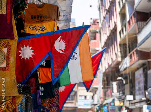 Flags of Nepal and India on Kathmandu street in a shop in Thamel district