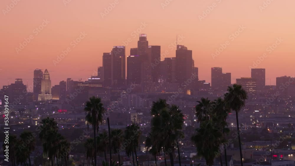 Blurred bokeh city lights background. Defocus background of skyscraper