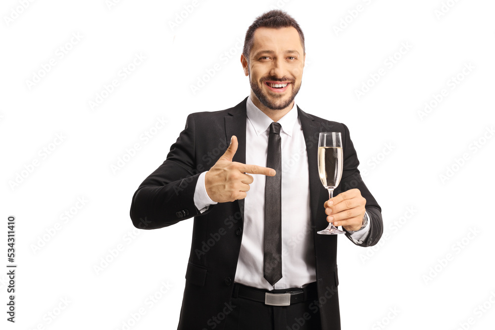 Businessman holding a glass of champagne and pointing at the glass Businessman holding a glass of champagne and pointing at the glass